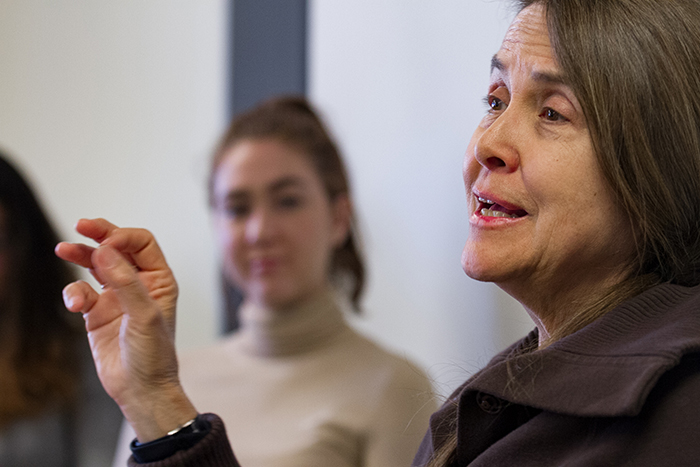 Poet Naomi Shihab Nye speaks with students studying literature, creative writing and cultural studies during her March 5-6 residency. Photo by Carl Socolow '77.