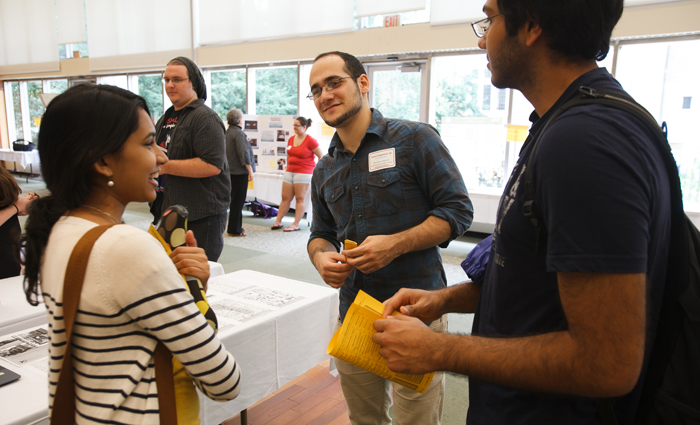 students gather at the Internship Fair to share their internship experiences.