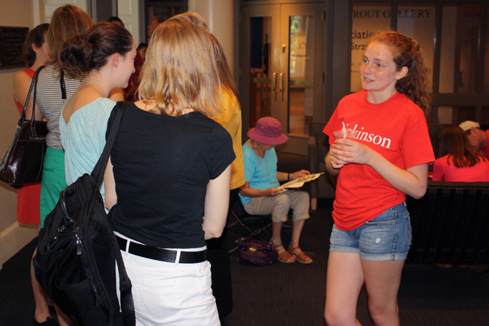 Tour guide talking with family during visit