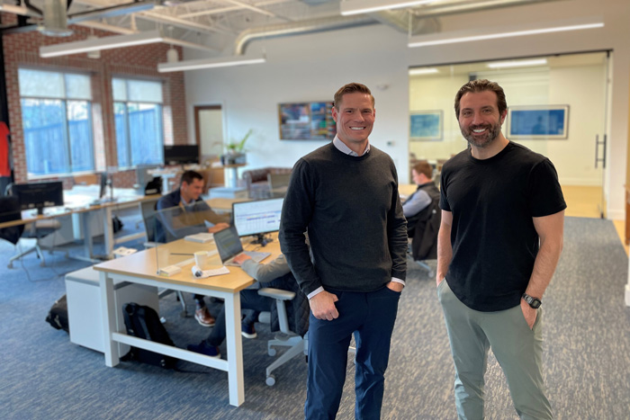 TJ Doyle and Ben Catanese in their office