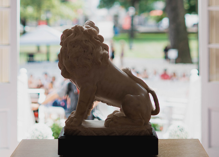 dickinson lion statue inside old west