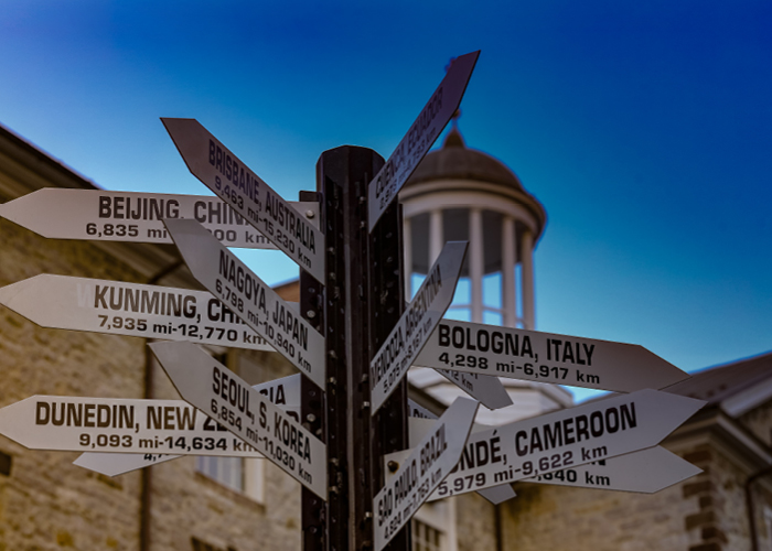 global cities sign and old west on the academic quad