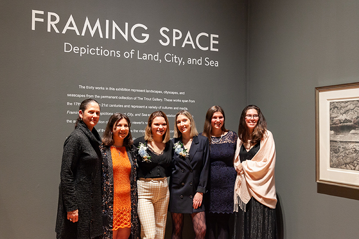Five student-curators pose with Professor of Art History Melinda Schlitt (far left) during the Feb. 28 opening reception. Photo by Carl Socolow '77. 