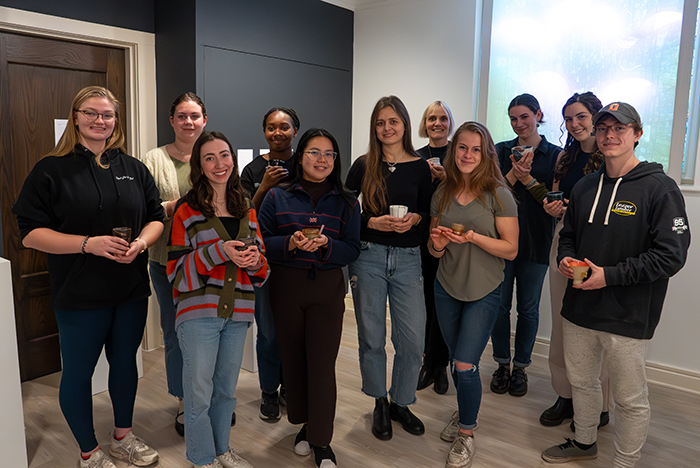 Artist-in-residence Veronika Yadukha (center), with English majors in Dickinson's 2023-24 senior seminar. Photo by Stephen Munchel.