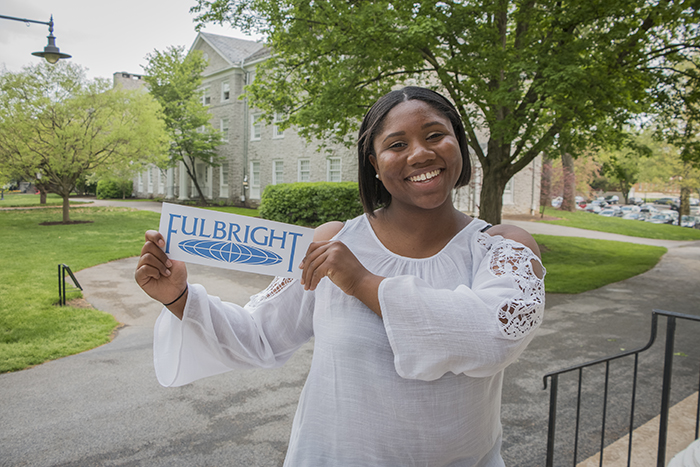 This 2018 video still captures Ashley Morefield '18 as she prepares for her 2018-19 Fulbright year. Now, she's earned a prestigious Pickering Fellowship.