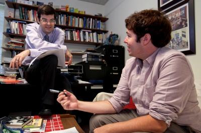 Professor David Ball talking with student Colin Tripp.