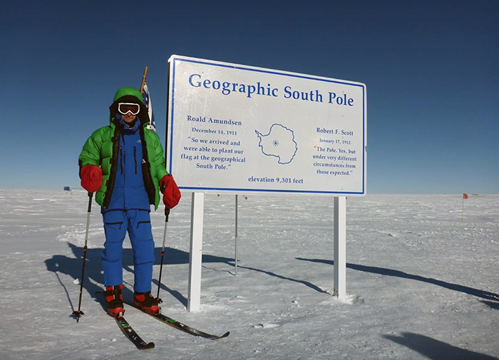 Kerr poses for a photo at the Geographic South Pole. "It was humbling," he says, "because not many people have an opportunity to see that part of the world."