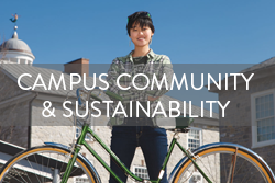 student with bike on dickinson campus