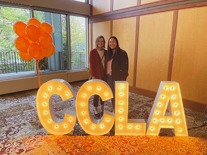 Anne Fisher-Henson '24 (left) presented research on the student-ambassador position during the 2023 CCLA Civic Engagement Celebration last spring. Above, she poses with former student-ambassador Jessie Hayes '22.