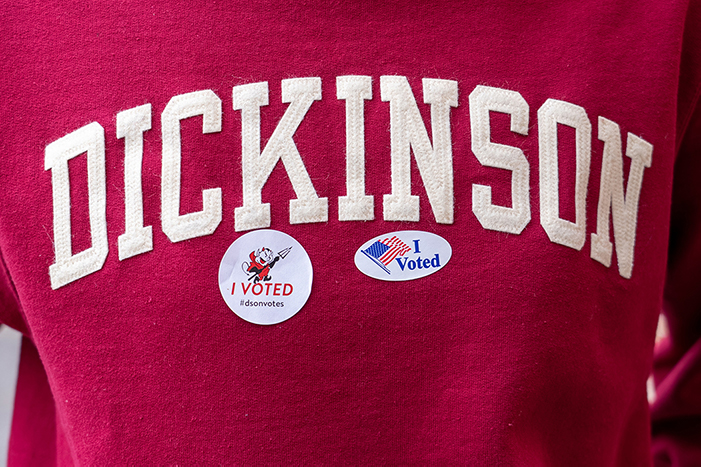 Dickinson sweatshirt with I Voted stickers