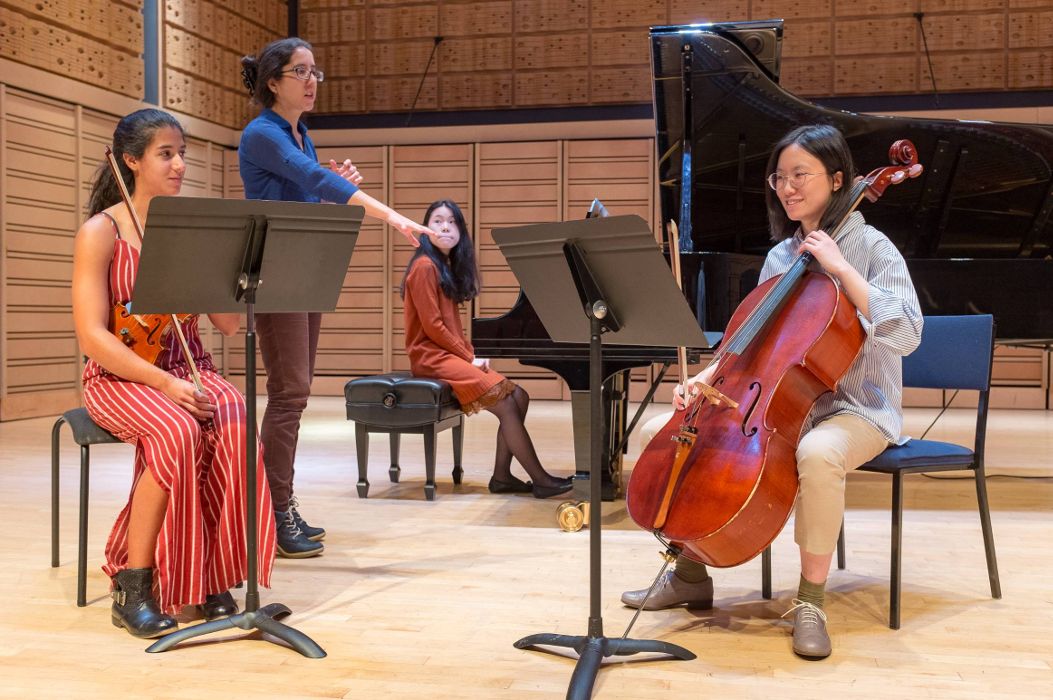 Chamber music students work with a clinician during a masterclass.