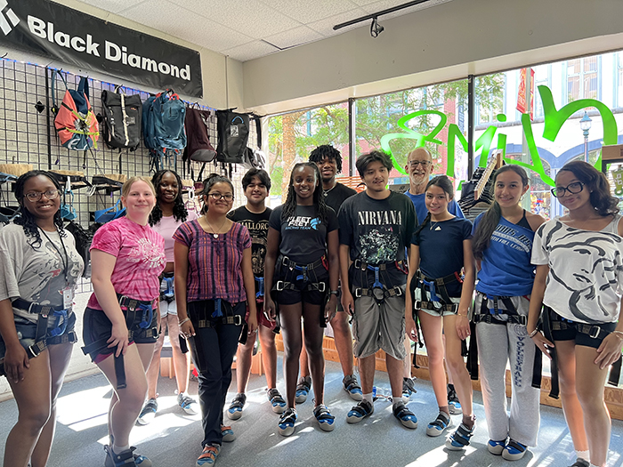The Chicago Posse bonds during a rock-climbing retreat in Kalamazoo, Mich. Photo courtesy of Gracia Johnson '29.