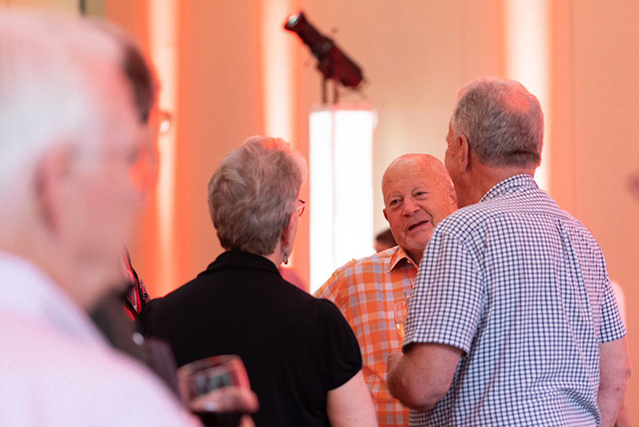 Members of the class of 1971 attend a small-group gathering on campus. Photo by Dan Loh.