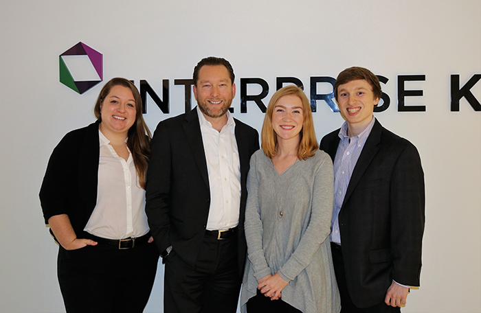 From left: Enterprise Knowledge’s Corinne Aherne ’14 (psychology), Zach Wahl ’98 (environmental studies, political science), Claire Brawdy ’16 (history) and James Midkiff ’17 (computer science).