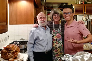 Trung Nguyen '19 and his Friendship Family as they prepare their Thanksgiving meal. Photo courtesy of Trung Nguyen.