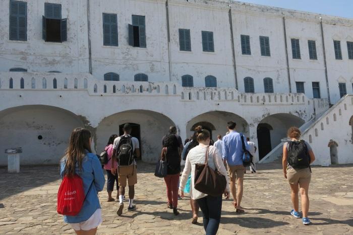 students enter Cape Coast Castle