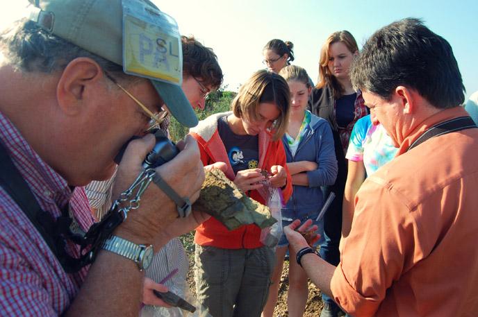 Group examines fossil specimens