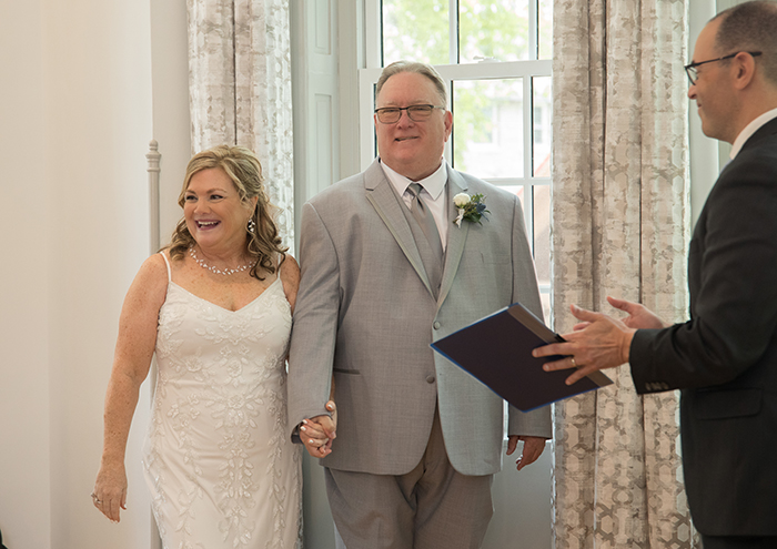Mayor Sean Schultz presents the newly married couple. Photo credit: Royce Images Photography.