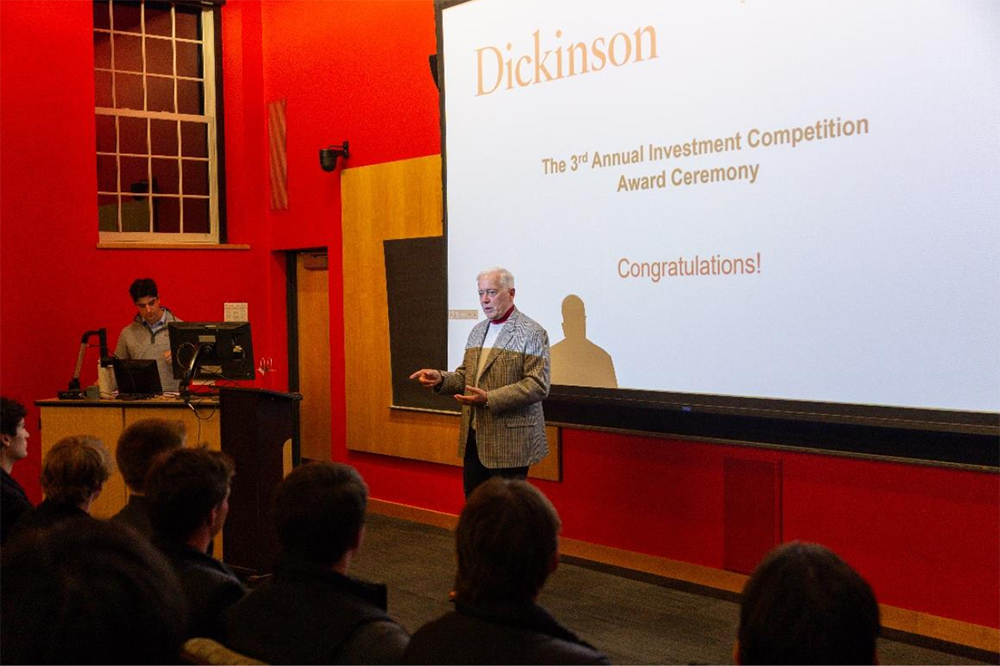 2025 Investment Competition photo featuring President John E. Jones III ’77, P’11, delivering remarks at the awards ceremony.
