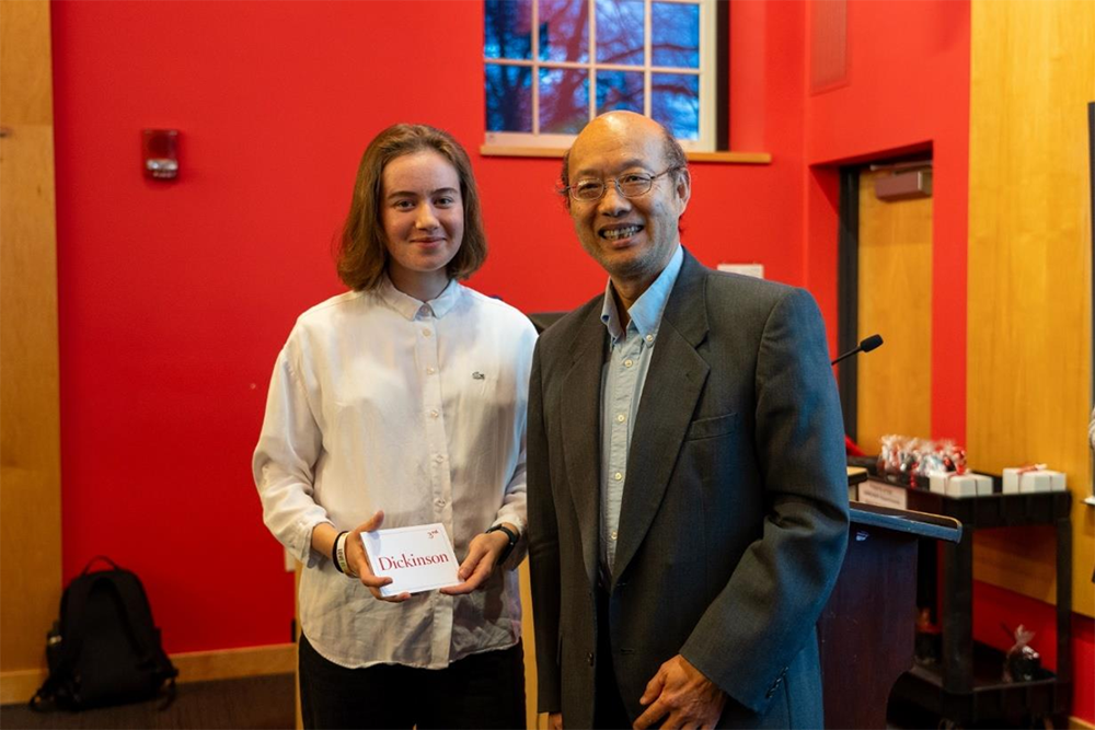 2023 Investment Competition photo featuring Professor Dengjian Jin (INBM), and the Third-Place Winner