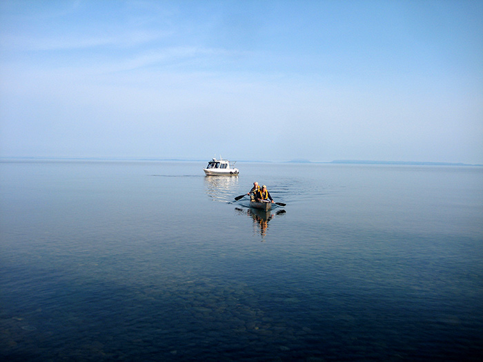 People on a boat in a lake