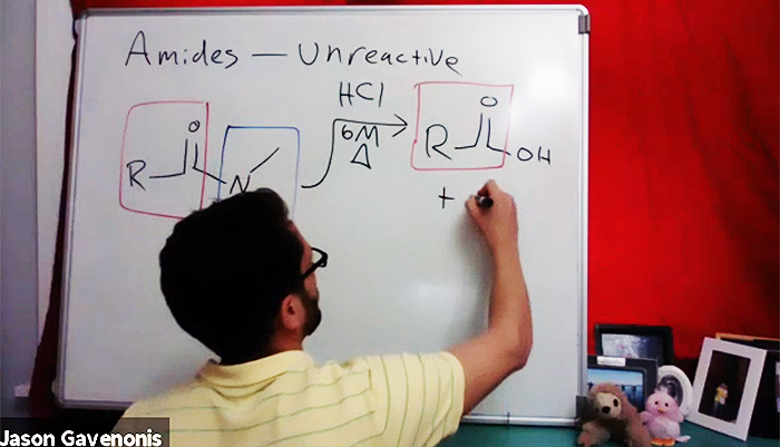 Assistant Professor of Chemistry Jason Gavenonis simulates a classroom experience by using a whiteboard from his home office.