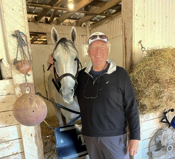 Jim Chambers '78 and Coconut Cake, a Maryland Millions Ladies Turf champion mare.
