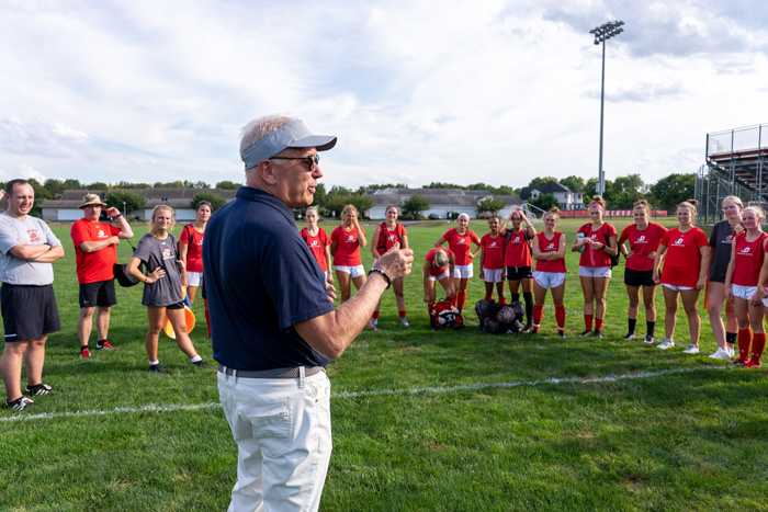 President Jones and the women's soccer team