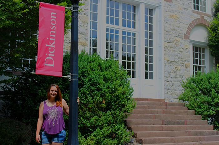 Katelyn King '18 in front of Old West.