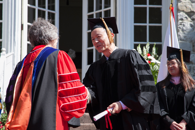 David Kim receiving his honorary degree. 