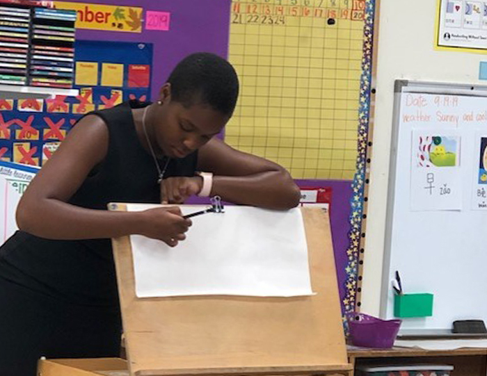 Aisha Johnson '20 teaches Chinese to young learners at the Dickinson College Children's Center through the Russian department's internship program in 2019. The program is currently being expanded and formalized.