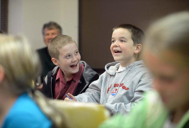 Students laughing at a Dickinson College Latin Club event. 