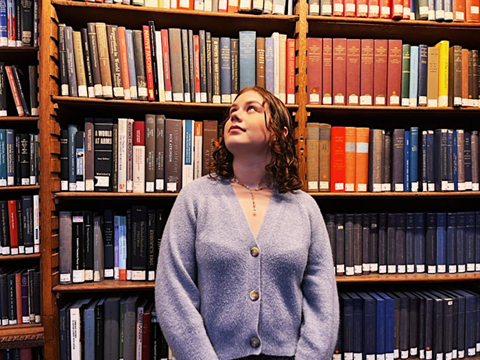Lily Bibro '24 in her happy place, the Duke Humfrey’s Library, which is the oldest reading room in the Bodleian Library at the University of Oxford.