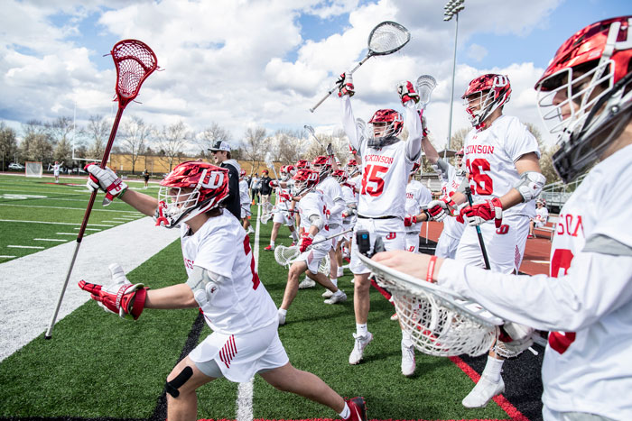 men's lacrosse celebrates