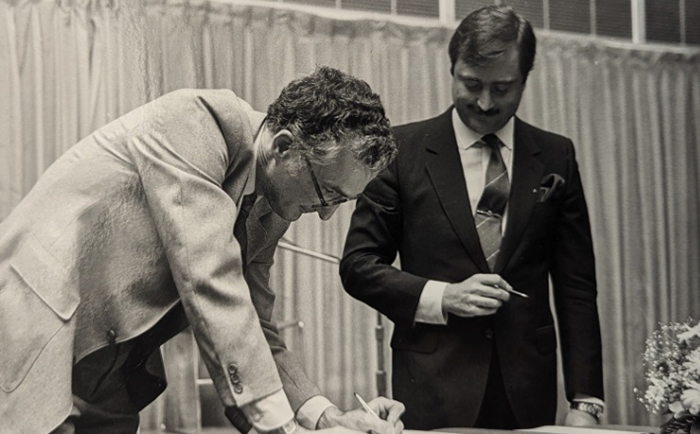 Acting President George Allan and University of Málaga Rector José María Martín Delgado