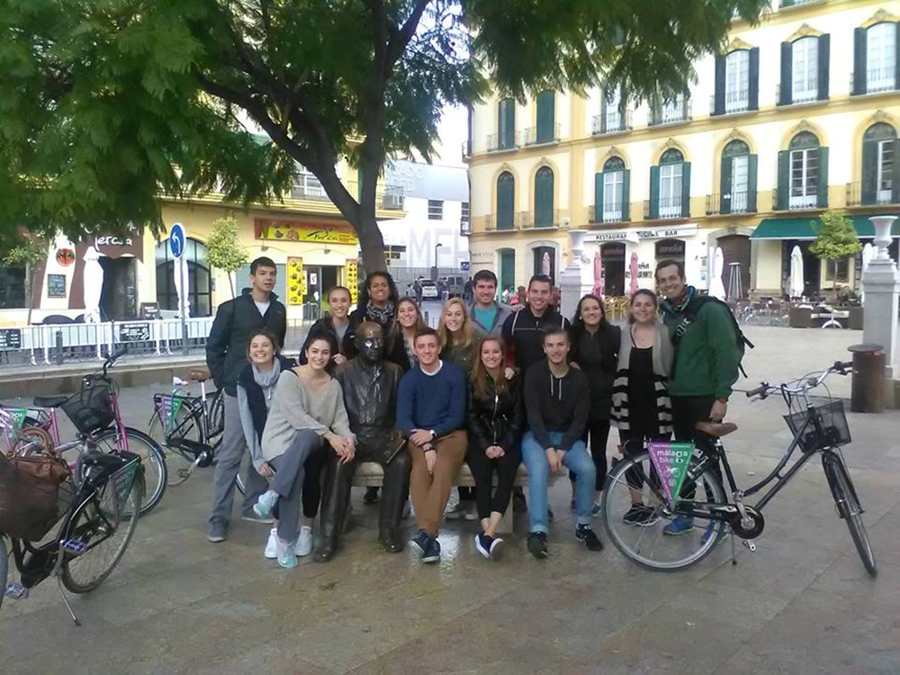 Málaga Director Eva Copeland with students in thr streets of Spain