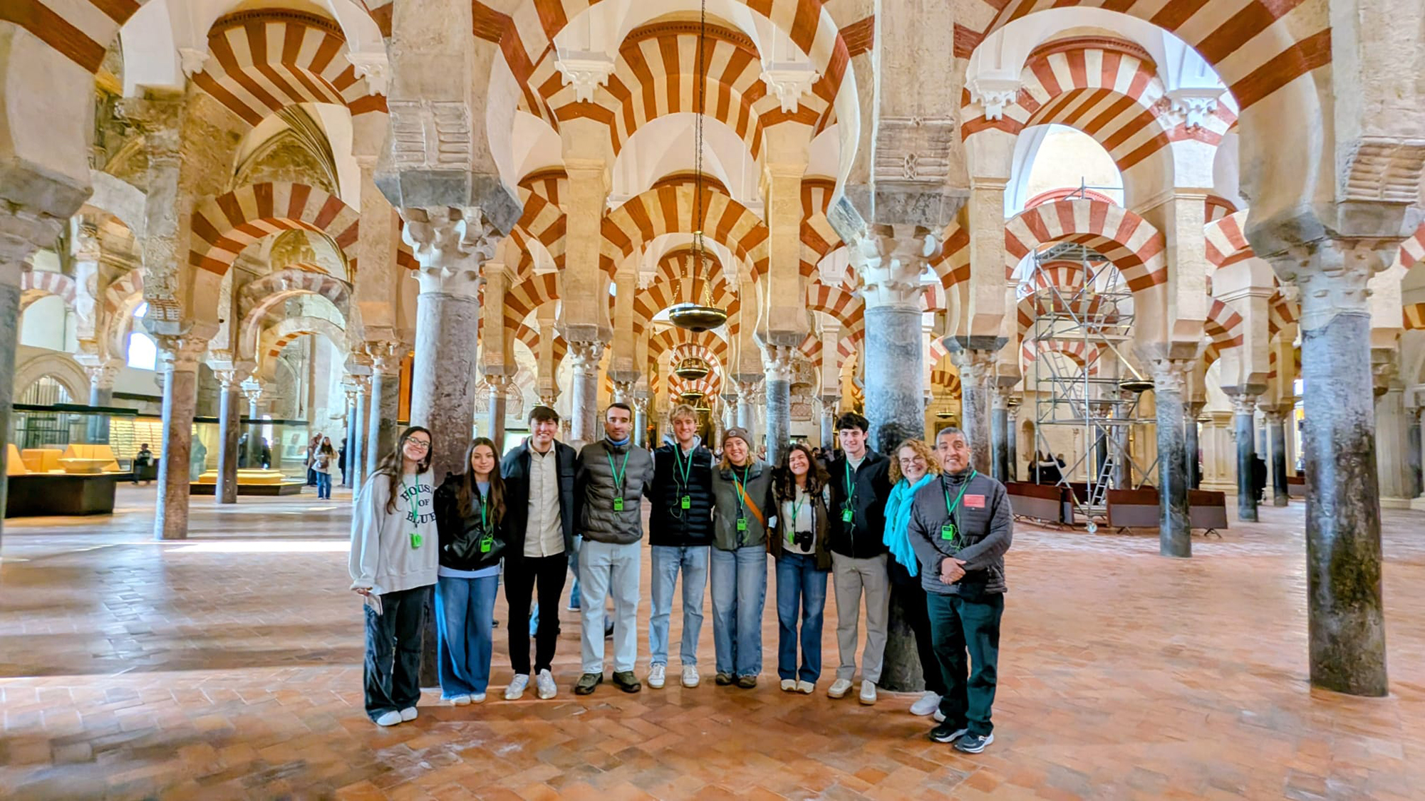 Málaga Director Erin Díaz with students at a museum in Spain