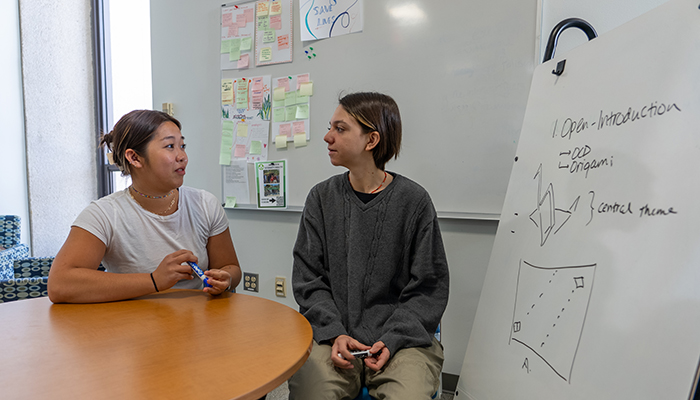 Students studying in the Multicultural Writing Center