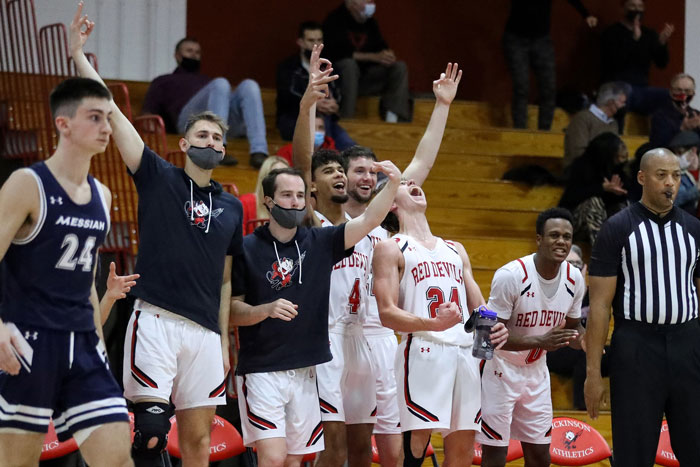 the men's team celebrates