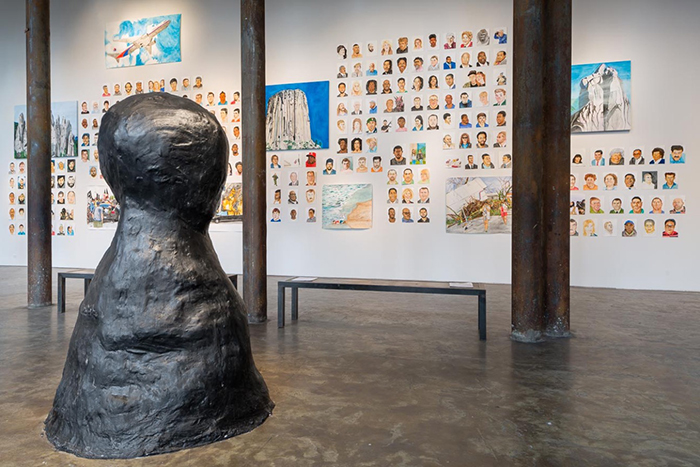 Rudy Shepherd, installation view of Everything in the Universe is My Brother, solo exhibition at Smack Mellon Gallery, Brooklyn, N.Y. (Black Rock Negative Energy Absorber sculpture in the foreground). Photo by Etienne Frossard.