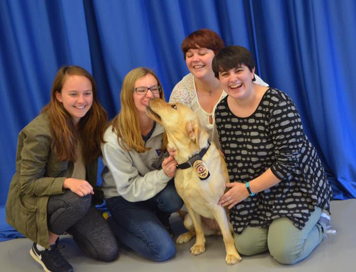 Students involved with the Dog House traveled to Virginia last November to see Olive graduate from CIA training.