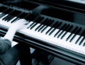 Person playing piano.