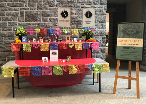 A traditional Dia De Los Muertos table presentation