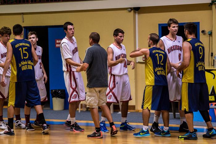 Teams shake hands at the end of the game