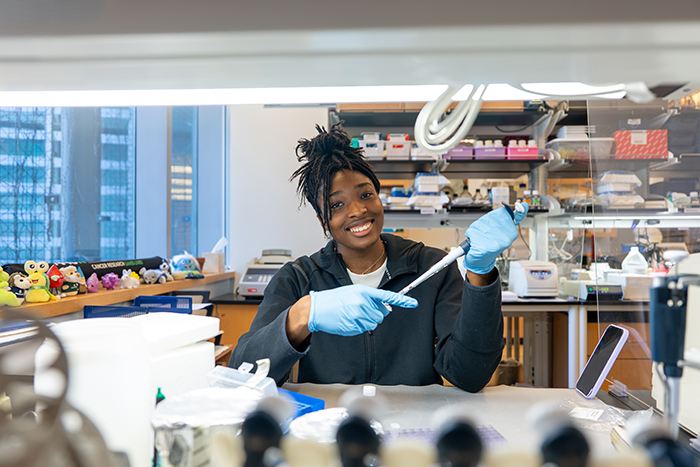 A Dickinson student participating in a cancer research lab