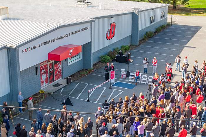 A crowd attending the opening of the HARE FAMILY SPORTS PERFORMANCE &amp; TRAINING CENTER