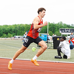 Dickinson Athlete Trevor Richwine running on a track