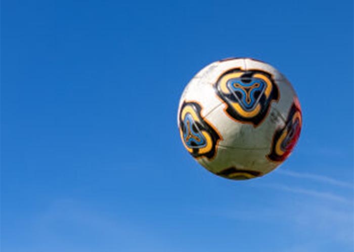 a soccer ball in the air