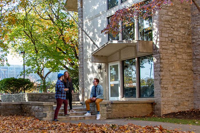 Students outside fall lower quad 700 