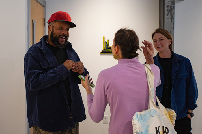 Warith Taha interacted with students and faculty throughout his time on campus. Photo by Riley Heffron ’26.